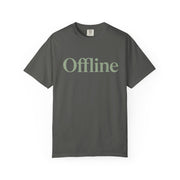 Green t-shirt with a black cross on a white background