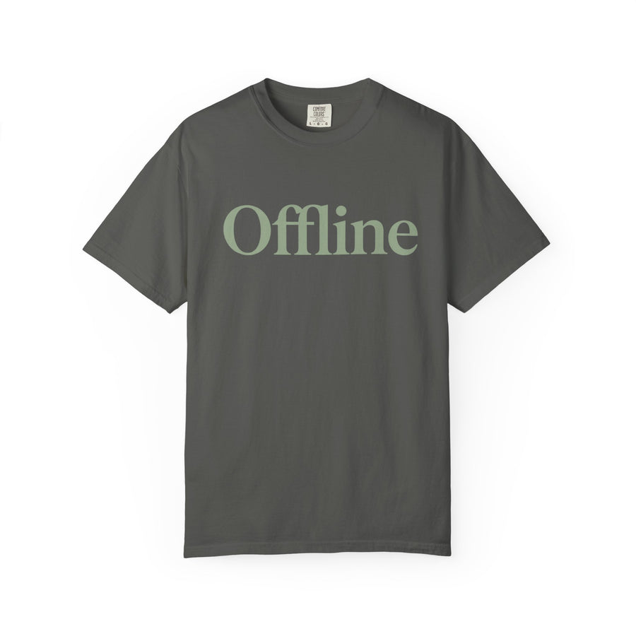 Green t-shirt with a black cross on a white background
